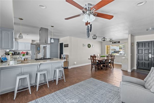 Dining room, Interior, Kitchen, Pendant Lights, Recessed Lighting, Stainless Steel Appliances, Wood Texture Flooring