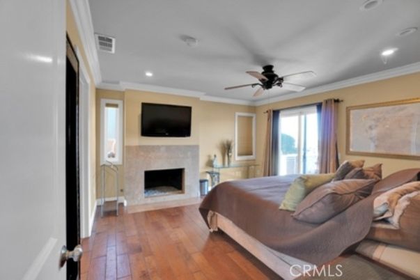 Bedroom, Fireplace, Interior, Recessed Lighting, Wood Texture Flooring