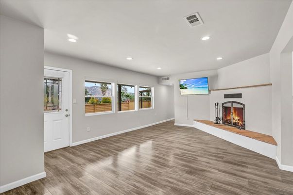 Empty room, Fireplace, Interior, Recessed Lighting, Wood Texture Flooring