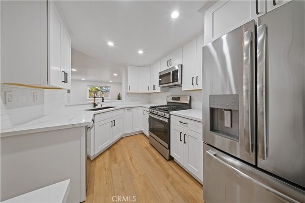 Interior, Kitchen, Recessed Lighting, Stainless Steel Appliances, Wood Texture Flooring