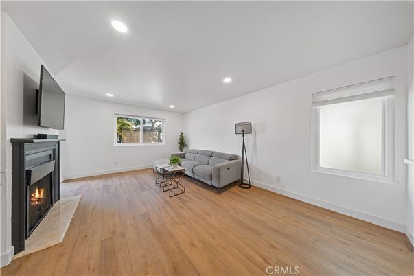 Fireplace, Interior, Living room, Recessed Lighting, Wood Texture Flooring