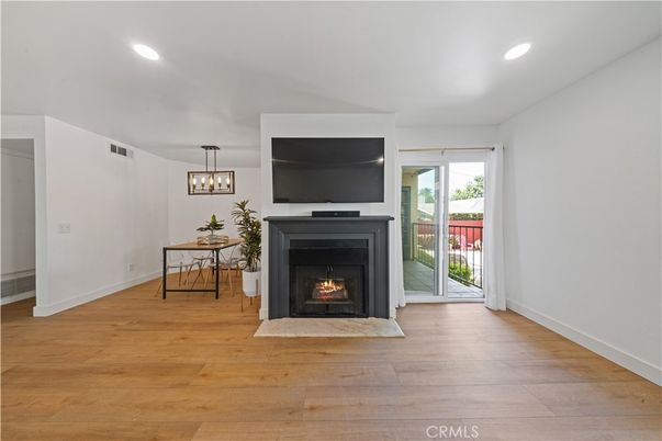 Dining room, Fireplace, Interior, Pendant Lights, Recessed Lighting, Wood Texture Flooring