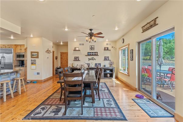 Dining room, Interior, Kitchen, Recessed Lighting, Stainless Steel Appliances, Wood Texture Flooring
