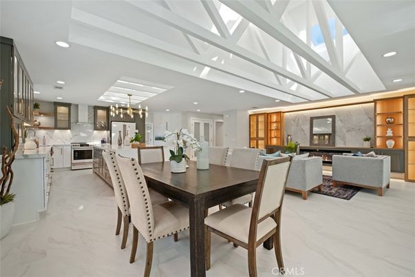 Dining room, Fireplace, Interior, Kitchen, Living room, Marble, Marble Walls, Pendant Lights, Recessed Lighting, Stainless Steel Appliances