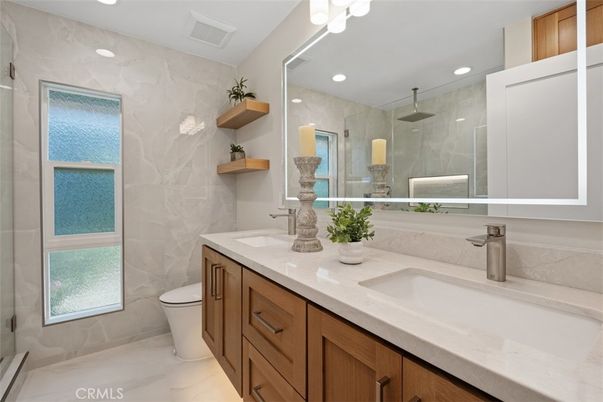Bathroom, Dual Sink Vanities, Glass Shower, Interior, Marble Walls, Recessed Lighting
