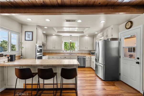 Interior, Kitchen, Recessed Lighting, Stainless Steel Appliances, Tile Countertops, Wooden Beams, Wooden Ceilings, Wood Texture Flooring