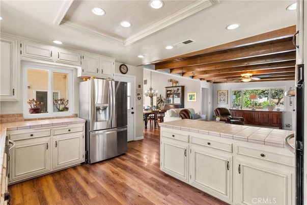 Dining room, Interior, Kitchen, Recessed Lighting, Stainless Steel Appliances, Tile Countertops, Wooden Beams, Wooden Ceilings, Wood Texture Flooring