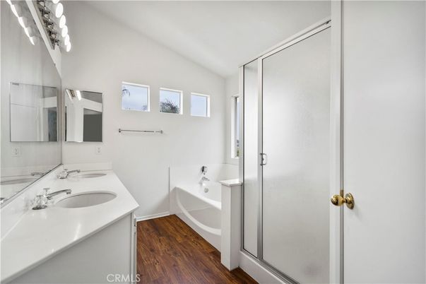 Bathroom, Dual Sink Vanities, Glass Shower, Interior, Wood Texture Flooring