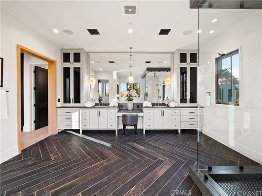 Bathroom, Dual Sink Vanities, Interior, Pendant Lights, Recessed Lighting, Wood Texture Flooring