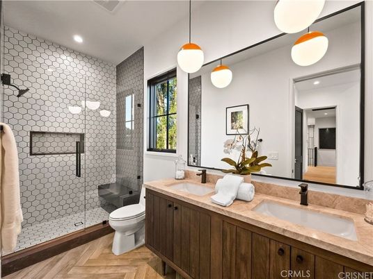 Bathroom, Dual Sink Vanities, Glass Shower, Interior, Pendant Lights, Recessed Lighting, Wood Texture Flooring