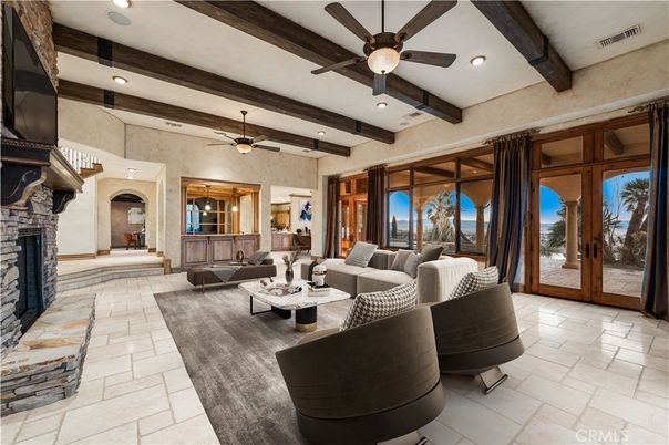 Fireplace, Interior, Living room, Recessed Lighting, Water, Wooden Beams