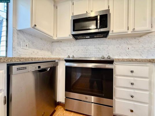 Interior, Kitchen, Marble Walls, Stainless Steel Appliances
