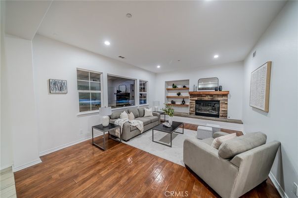 Fireplace, Interior, Living room, Recessed Lighting, Wood Texture Flooring