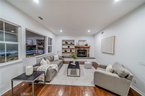 Fireplace, Interior, Living room, Recessed Lighting, Wood Texture Flooring