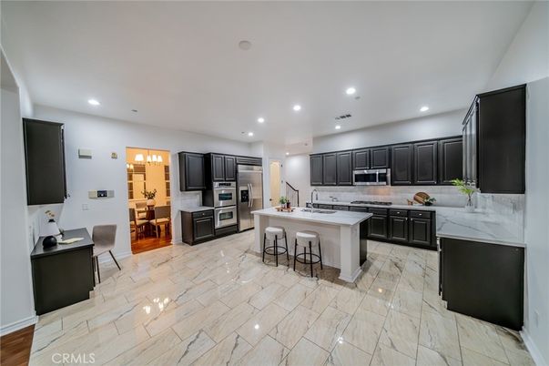 Dining room, Interior, Kitchen, Recessed Lighting, Stainless Steel Appliances, Wood Texture Flooring