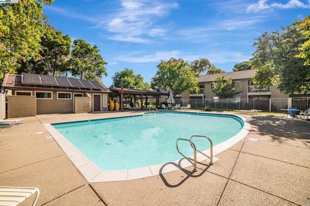 Exterior, Pool, Solar Panels