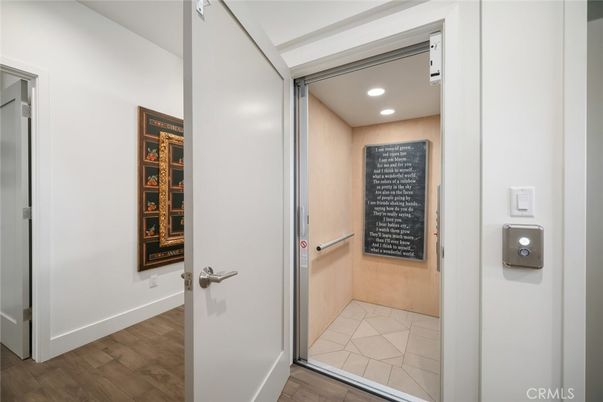 Elevator, Interior, Recessed Lighting, Wood Texture Flooring