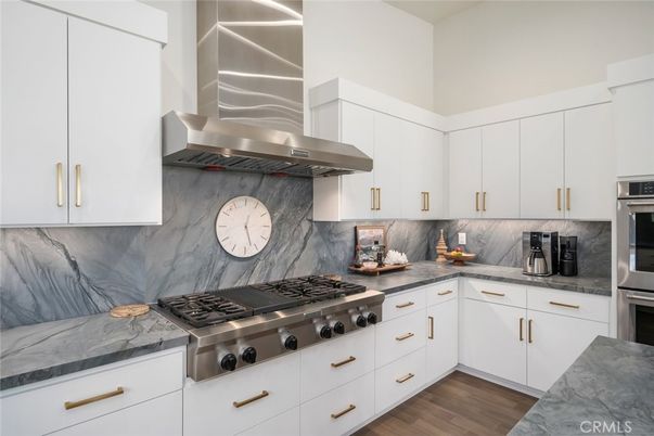 Interior, Kitchen, Marble Walls, Stainless Steel Appliances, Wood Texture Flooring