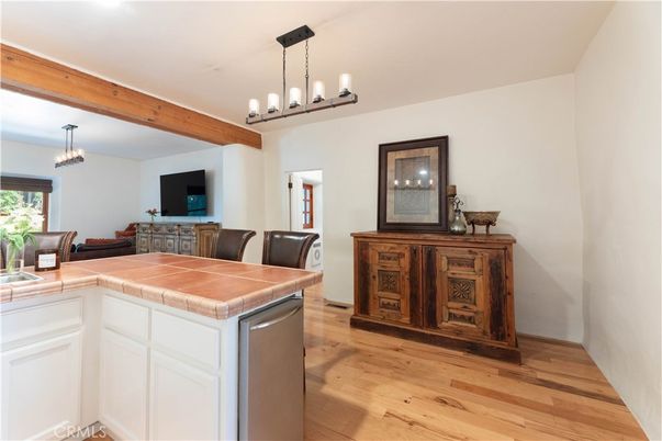 Chandelier, Interior, Kitchen, Pendant Lights, Tile Countertops, Wood Texture Flooring