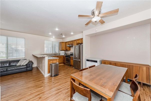Dining room, Interior, Kitchen, Recessed Lighting, Stainless Steel Appliances, Wood Texture Flooring