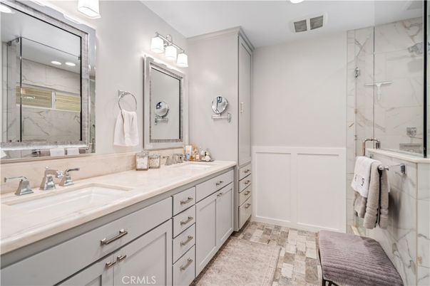 Bathroom, Dual Sink Vanities, Glass Shower, Interior, Marble Walls, Recessed Lighting