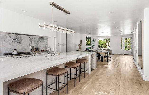 Chandelier, Dining room, Interior, Kitchen, Marble Walls, Recessed Lighting, Wood Texture Flooring