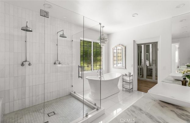 Bathroom, Chandelier, Dual Sink Vanities, Free Standing Baths, Glass Shower, Interior, Recessed Lighting, Wood Texture Flooring