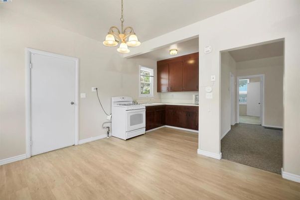 Interior, Kitchen, Pendant Lights, Washer, Wood Texture Flooring