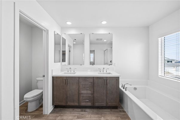 Bathroom, Dual Sink Vanities, Interior, Recessed Lighting, Wood Texture Flooring
