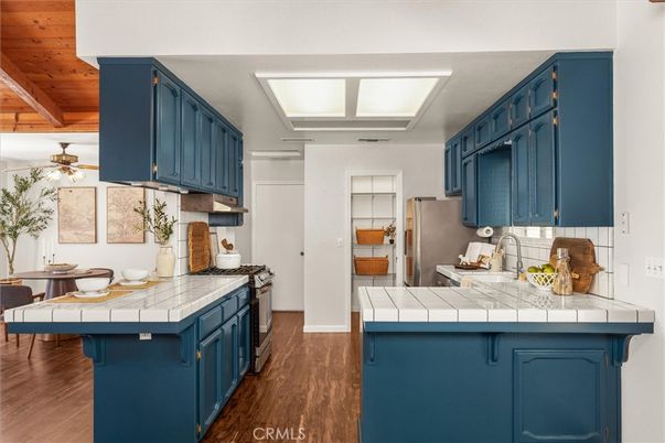 Interior, Kitchen, Tile Countertops, Wooden Ceilings, Wood Texture Flooring