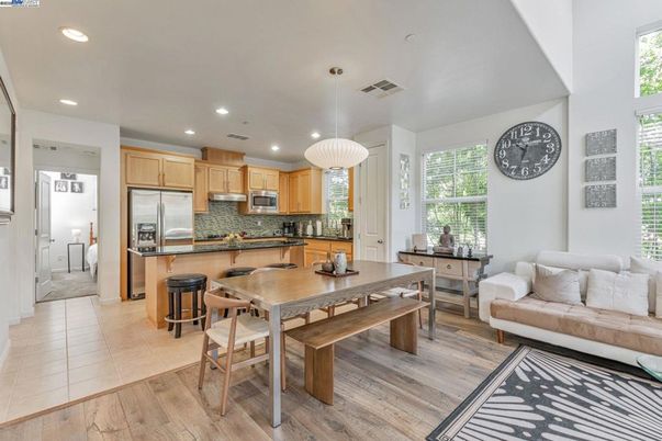 Dining room, Interior, Kitchen, Pendant Lights, Recessed Lighting, Stainless Steel Appliances, Wood Texture Flooring