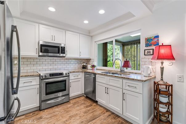 Interior, Kitchen, Recessed Lighting, Stainless Steel Appliances, Wood Texture Flooring