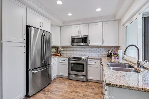 Interior, Kitchen, Recessed Lighting, Stainless Steel Appliances, Wood Texture Flooring