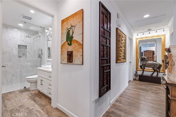 Bathroom, Glass Shower, Interior, Marble Walls, Recessed Lighting, Wood Texture Flooring