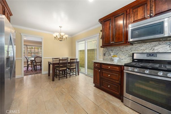 Chandelier, Dining room, Interior, Kitchen, Recessed Lighting, Stainless Steel Appliances