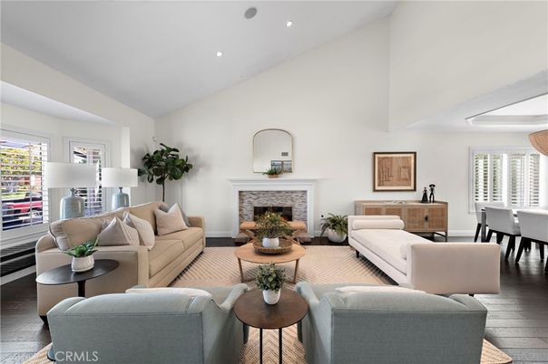 Dining room, Fireplace, Interior, Living room, Recessed Lighting, Wood Texture Flooring