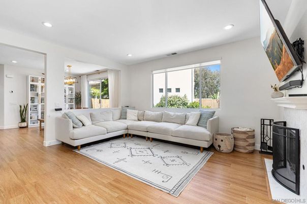 Chandelier, Fireplace, Interior, Living room, Recessed Lighting, Wood Texture Flooring