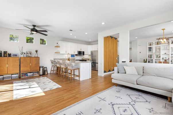 Dining room, Interior, Kitchen, Living room, Pendant Lights, Recessed Lighting, Stainless Steel Appliances, Wood Texture Flooring