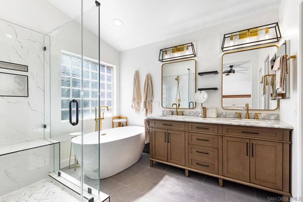 Bathroom, Dual Sink Vanities, Free Standing Baths, Glass Shower, Interior, Marble Walls, Recessed Lighting