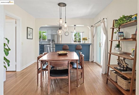 Dining room, Interior, Kitchen, Pendant Lights, Stainless Steel Appliances, Wood Texture Flooring
