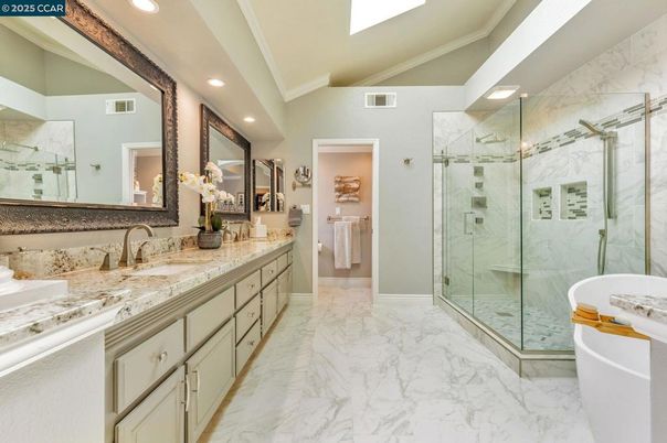 Bathroom, Dual Sink Vanities, Free Standing Baths, Glass Shower, Interior, Marble, Marble Walls, Recessed Lighting