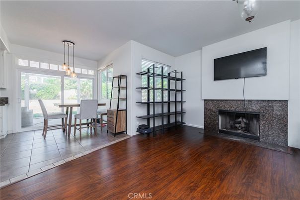 Dining room, Fireplace, Interior, Pendant Lights, Wood Texture Flooring