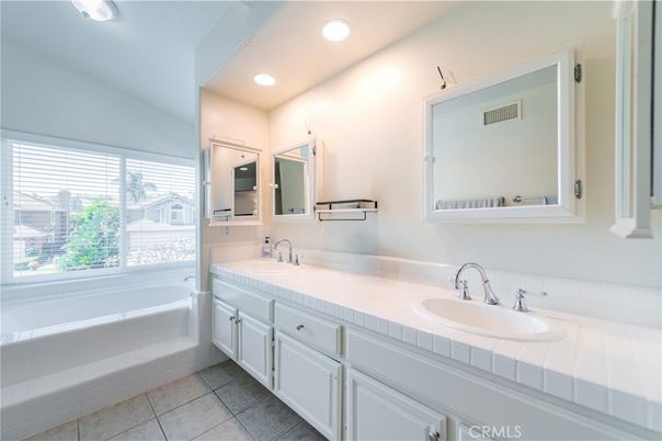 Bathroom, Dual Sink Vanities, Interior, Recessed Lighting, Tile Countertops