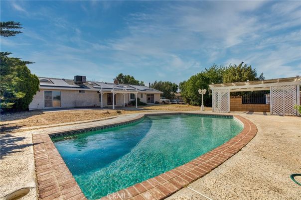 Exterior, Pool, Solar Panels