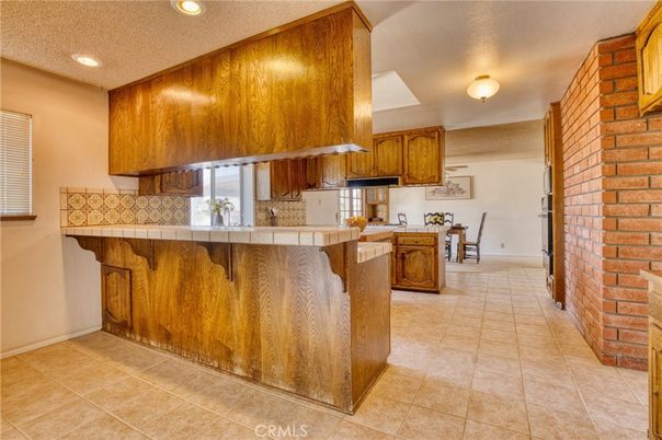 Dining room, Interior, Kitchen, Recessed Lighting, Stone Walls, Tile Countertops