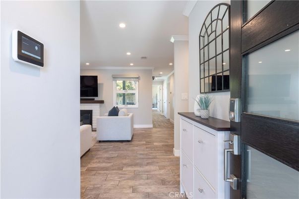 Fireplace, Interior, Living room, Recessed Lighting, Wood Texture Flooring