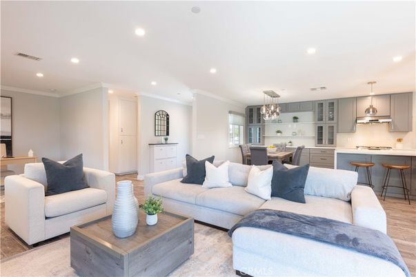 Chandelier, Dining room, Interior, Kitchen, Living room, Pendant Lights, Recessed Lighting, Wood Texture Flooring