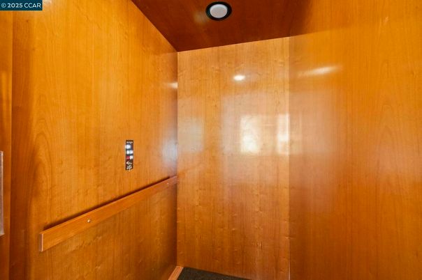 Elevator, Interior, Recessed Lighting, Wooden Ceilings, Wooden Walls