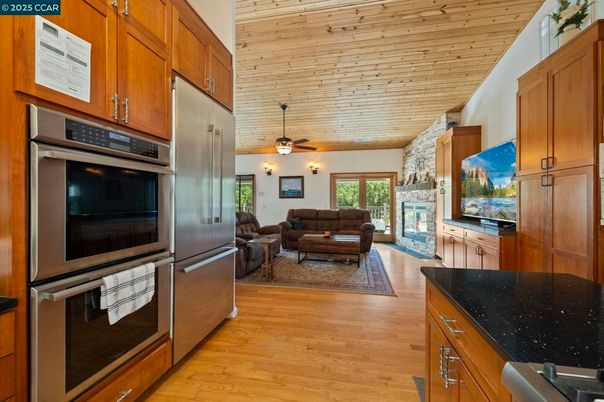 Fireplace, Interior, Kitchen, Living room, Stainless Steel Appliances, Wooden Ceilings, Wood Texture Flooring, Wooden Walls