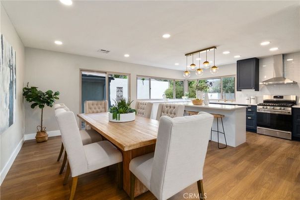 Dining room, Interior, Kitchen, Pendant Lights, Recessed Lighting, Stainless Steel Appliances, Wood Texture Flooring